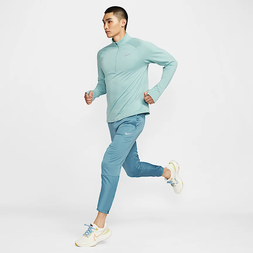 NIKE Stride — Men's Therma-FIT Repel Winta Rise Do 1/2 Zip Running Top - Image 8