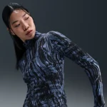 NIKE スウィフト — ウィメンズ Dri-FIT UV 1/2ジップ プリント ランニングトップ